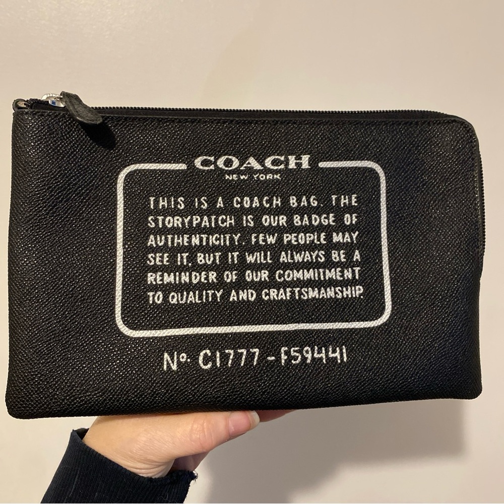 COACH Black Canvas Zip Pouch with White Storypatch Text